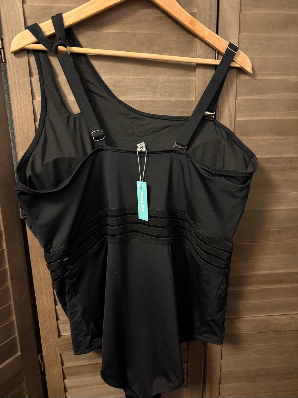 Black one piece swimsuit. One sides shoulder strap. - Picture 2 of 6